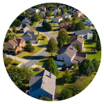 circular image of a community of homes.